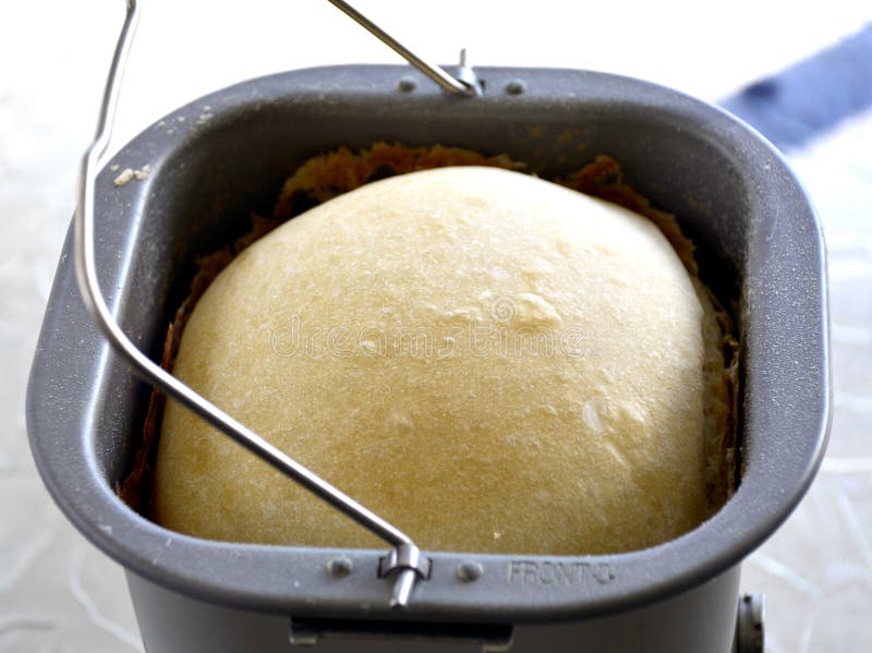 Homemade bread in the bread maker crispy fresh tasty.