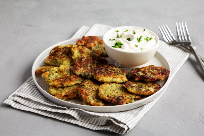 Homemade Broccoli Cheddar Fritters on a Plate, Side View Stock Image