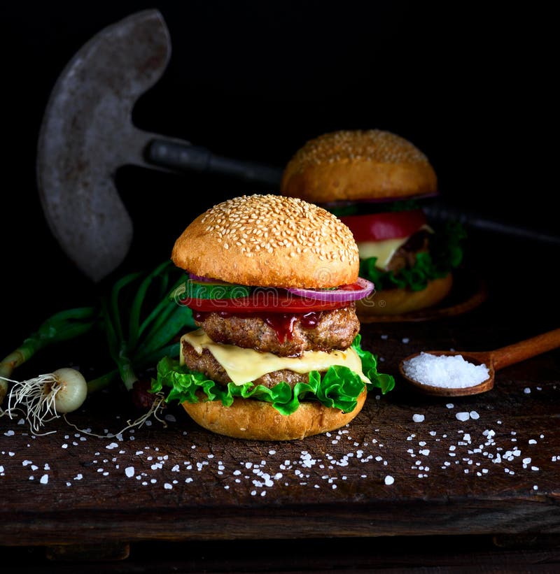 Homemade Burger with Lettuce, Cheese, Onion and Tomato Stock Image ...