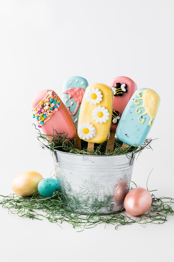 Homemade Cakesicles Decorated for Easter, in a Tin Pail. Stock Image