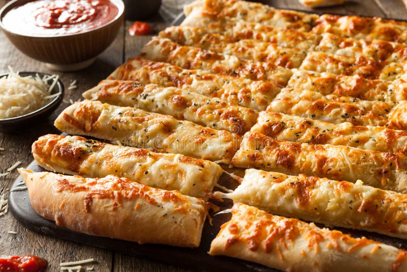 Homemade Cheesy Breadsticks with Marinara Stock Photo Image of italian, bread 52491492