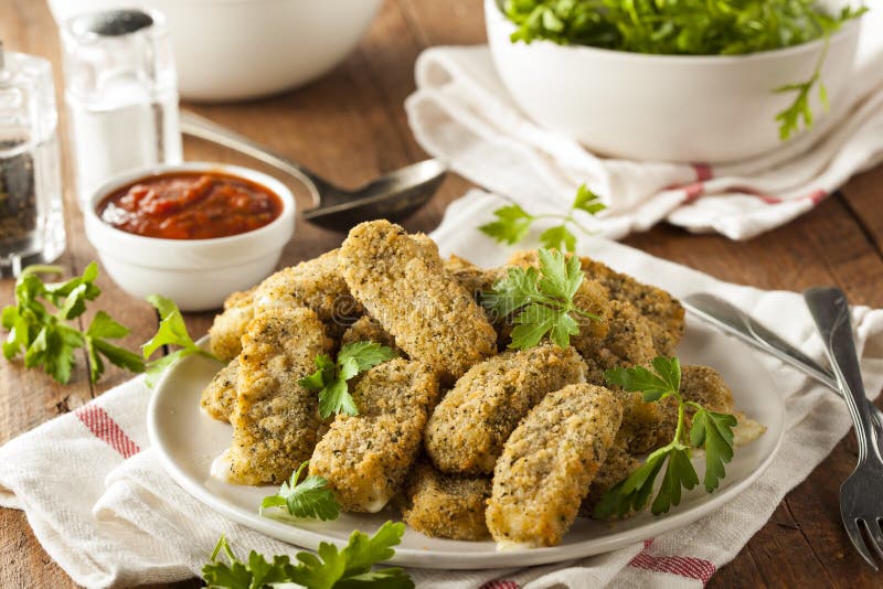 Homemade Cheesy Mozzarella Sticks royalty free stock photo