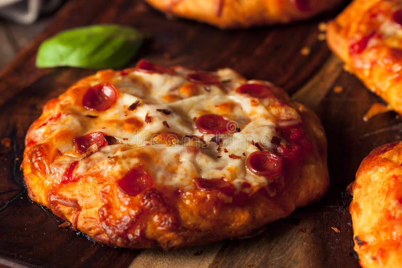 Homemade Cheesy Pepperoni PIzza on a Biscuit Stock Image Image of