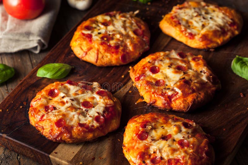 Homemade Cheesy Pepperoni PIzza on a Biscuit Stock Image Image of