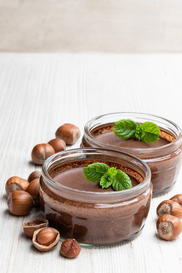 Homemade Chocolate Hazelnut Praline in Glass Jar on White Stock Photo