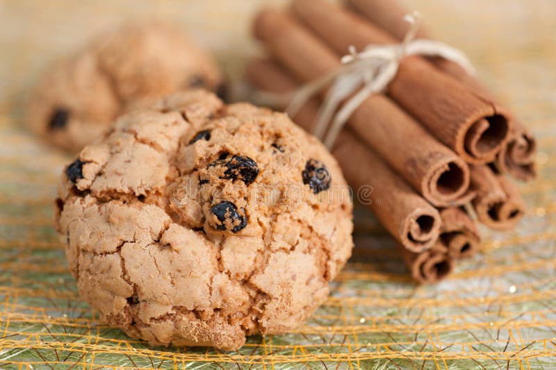 Homemade cookies with raisins and cinnamon sticks