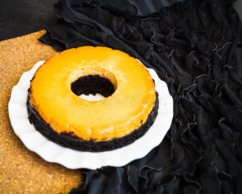 Homemade Creme Caramel Custard Pudding with Chocolate Cake. High Angle View. Stock Image Image