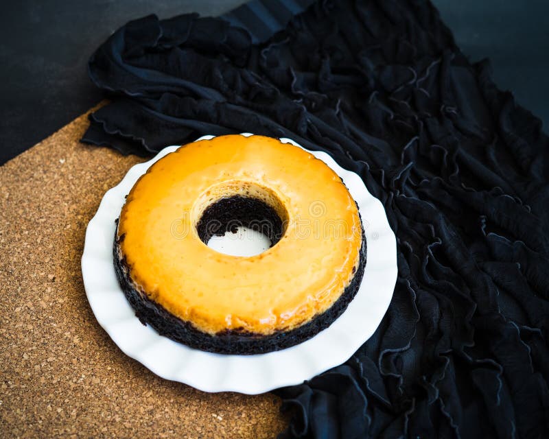 Homemade Creme Caramel Custard Pudding with Chocolate Cake. High Angle View. Stock Image Image