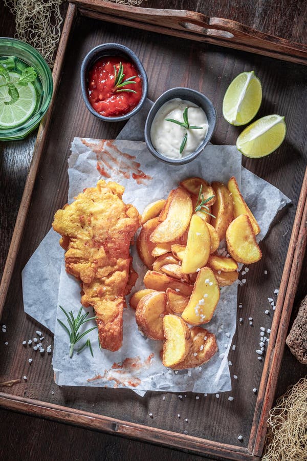 Homemade Fish and Chips Served with Lime and Salt Stock Photo Image of rustic, takeaway 244633108