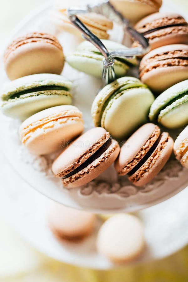 Homemade French Macaroons on the Plate, Pistachio, Coffee and Va Stock ...