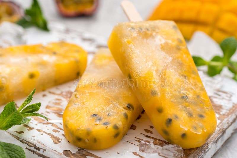 Homemade Frozen Popsicles with Fresh Mango and Passion Fruit Stock