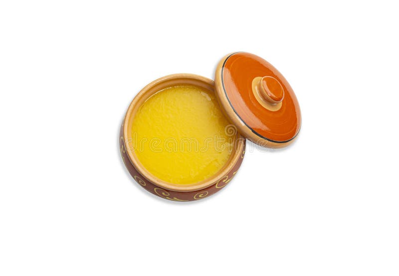 Homemade Ghee in a Ceramic Pot. Isolated White Background Stock Photo