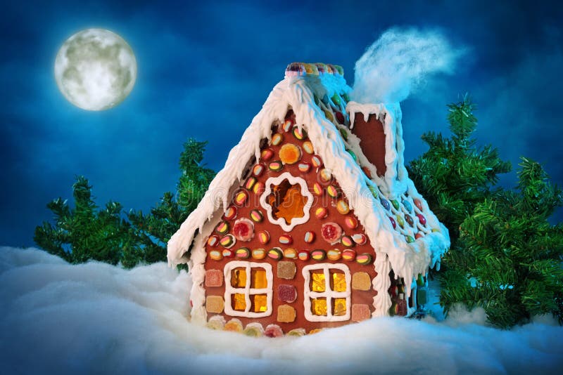 Homemade gingerbread house at night