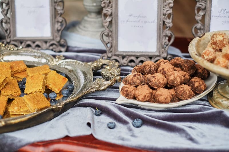 Homemade healthy vegan chocolate truffles with pistachio in the bowl. Organic energy vegetarian sweet balls stock images Homemade healthy vegan chocolate truffles with pistachio in the bowl. Organic energy vegetarian sweet balls stock images