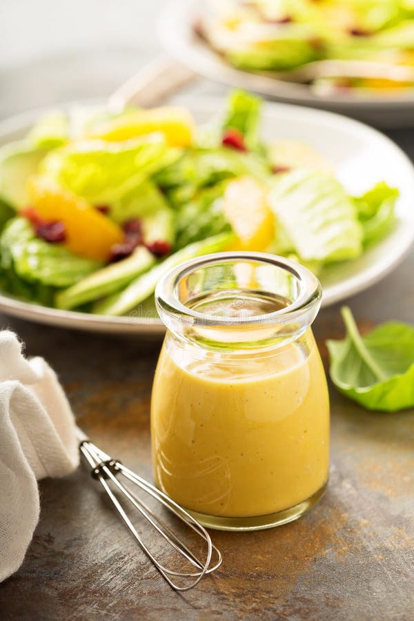 Homemade honey mustard salad dressing royalty free stock image