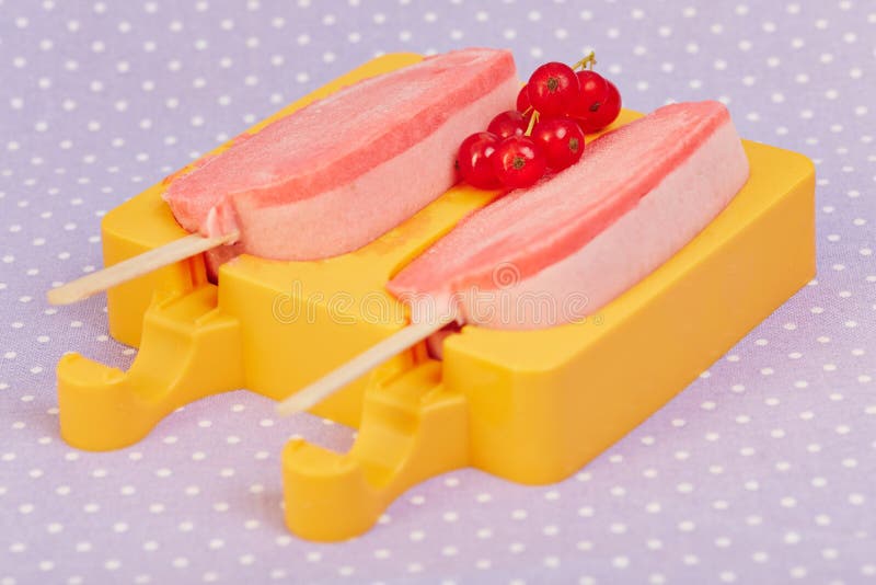 Homemade ice cream production with popsicle in a mold. Homemade ice cream production with popsicle in a mold