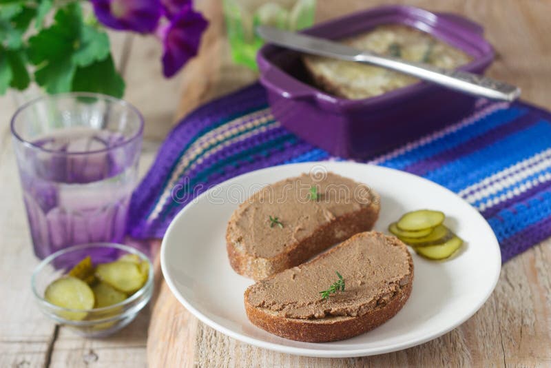 Homemade Liver Pate with Bread and Canned Cucumber. Rustic Style