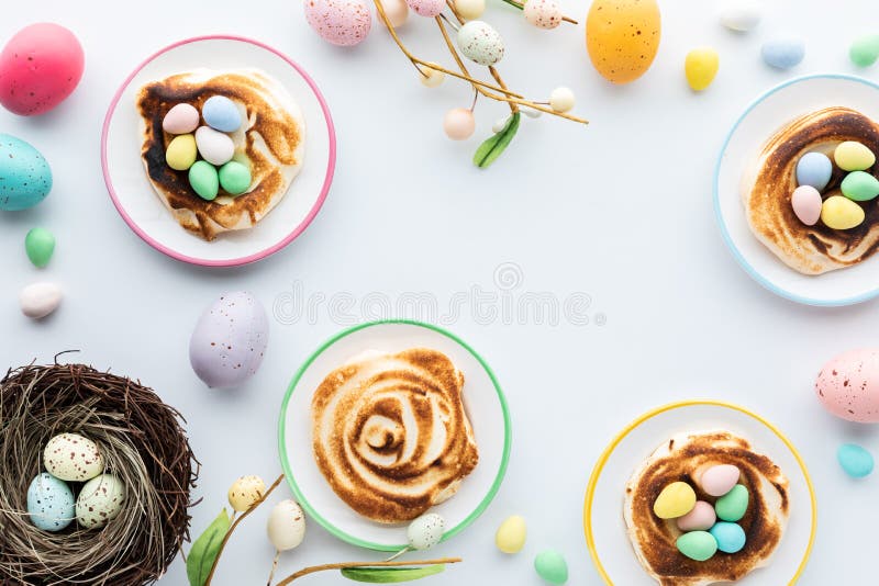 Homemade Meringue Nests Filled with Mini Chocolate Eggs for Easter