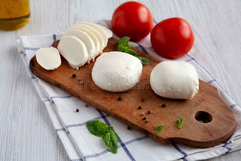 Homemade Mozzarella Cheese with Tomato, Basil and Olive Oil, Low Angle
