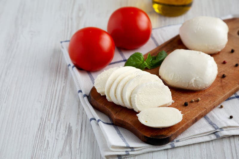 Homemade Mozzarella Cheese with Tomato, Basil and Olive Oil, Low Angle