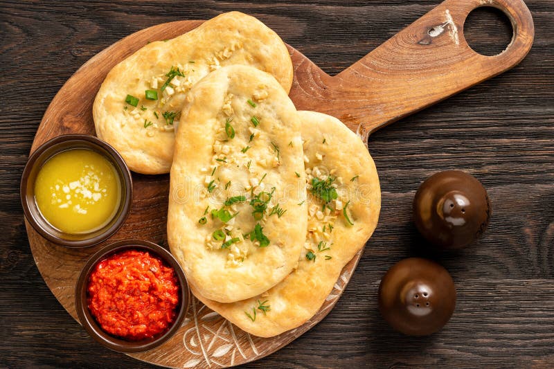 Homemade naan bread with garlic and butter.