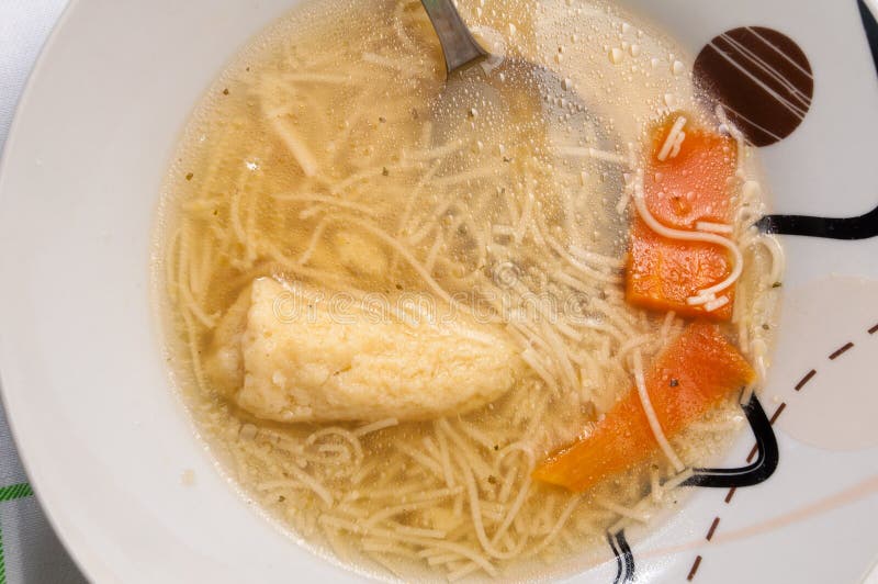 Homemade noodle soup served at the table