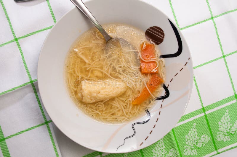 Homemade noodle soup served at the table