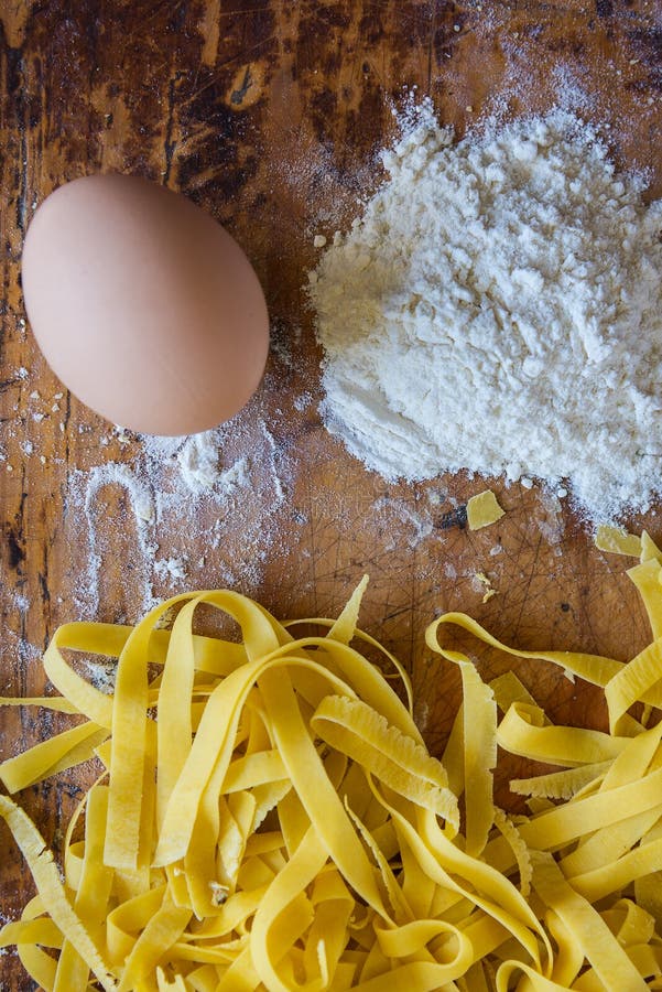 Homemade Noodles on Rustic Table stock image