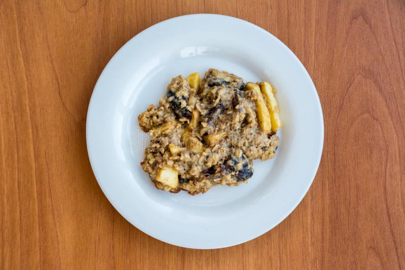 Homemade oatmeal cookies on plate on the wooden table stock images Homemade oatmeal cookies on plate on the wooden table stock images