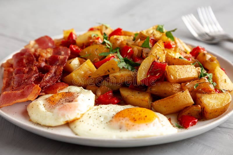 Homemade OnePan Breakfast Potatoes on a Plate, Side View Stock Image
