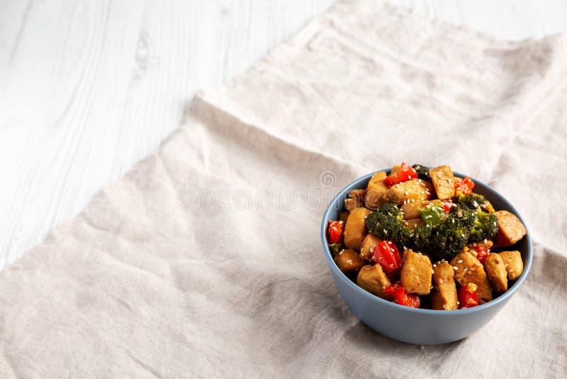 Homemade One-Pan Chicken and Broccoli Stir-Fry in a Bowl, Side View