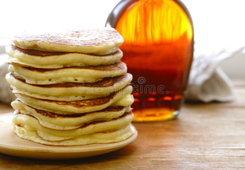 Homemade pancakes pile on a plate stock photo Homemade pancakes pile on a plate stock photo