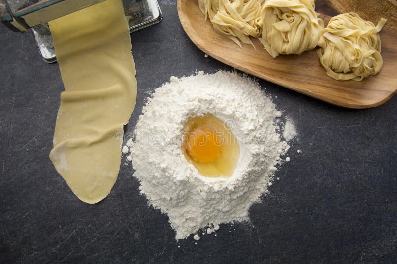 Making Pasta with Flour and Eggs Stock Image Image of dark, maker
