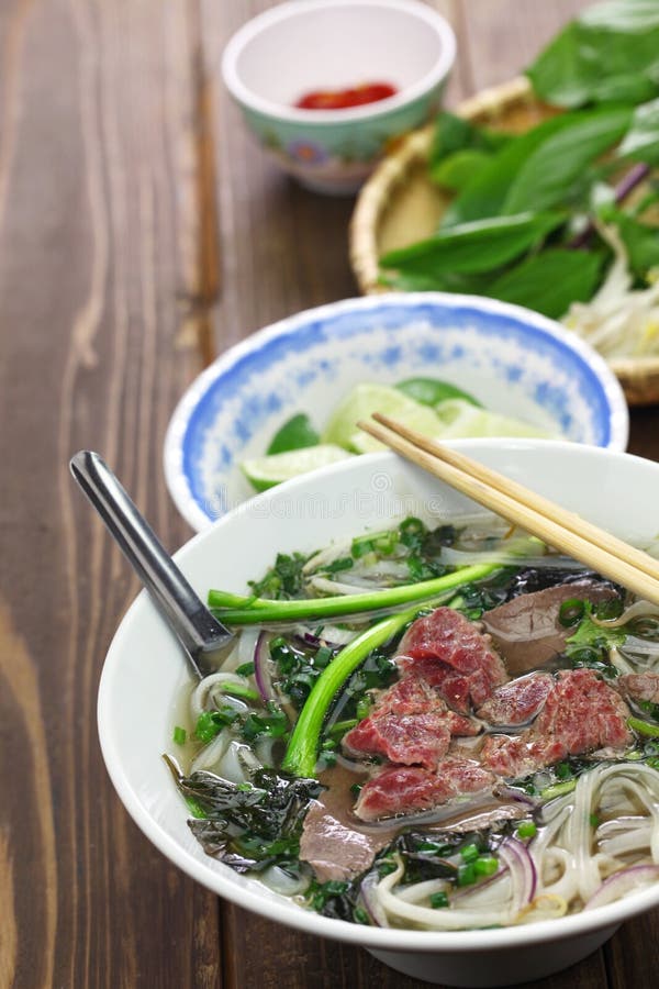 Pho Bo, Vietnamese Beef Noodle Soup Stock Image - Image of beef, sprout ...