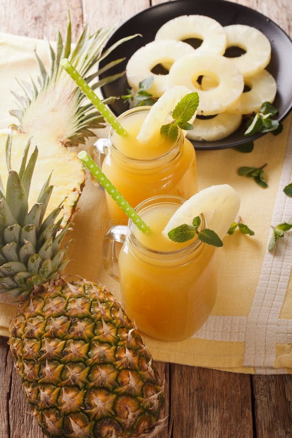 Homemade Pineapple Juice in a Glass Jar Closeup. Horizontal Top Stock