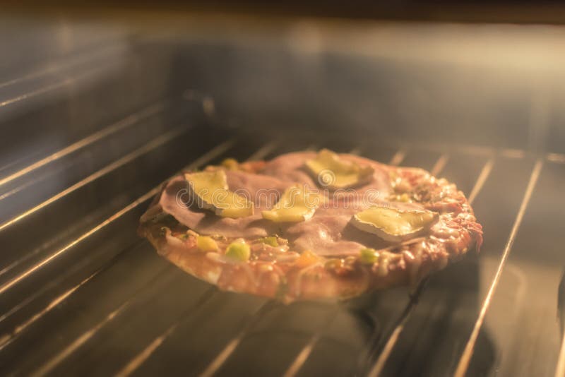 Homemade Pizza Baking in the Oven. Stock Image Image of closeup