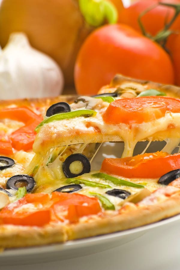 Homemade pizza fresh tomato olive mushroom cheese royalty free stock image