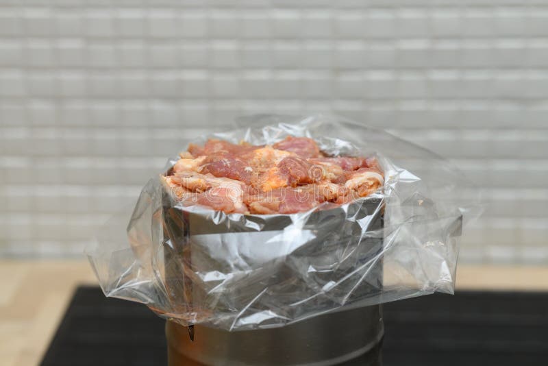 Homemade Pork Ham. the Process of Filling the Ham with Meat Stock Photo