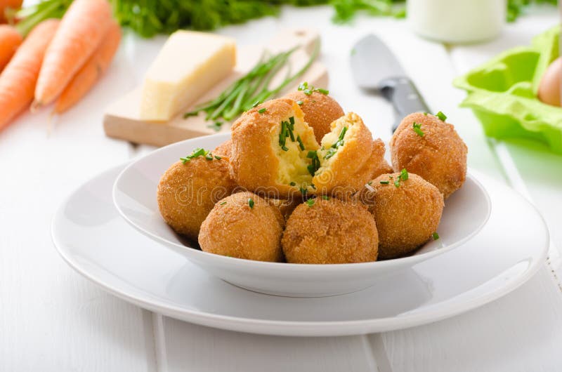 Homemade potato croquettes with parmesan and chives