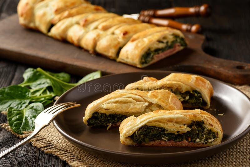 Homemade Puff Pastry Pie with Spinach, Ham and Cheese. Stock Image