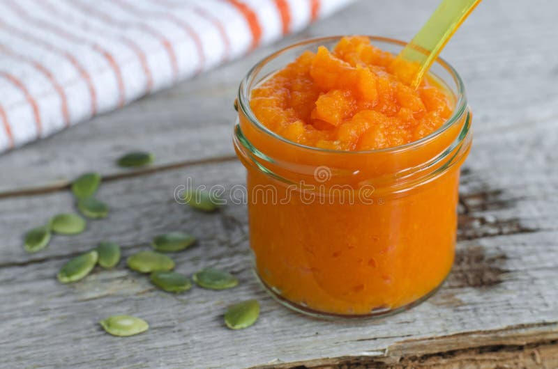 Homemade pumpkin cosmetic mask in a glass jar