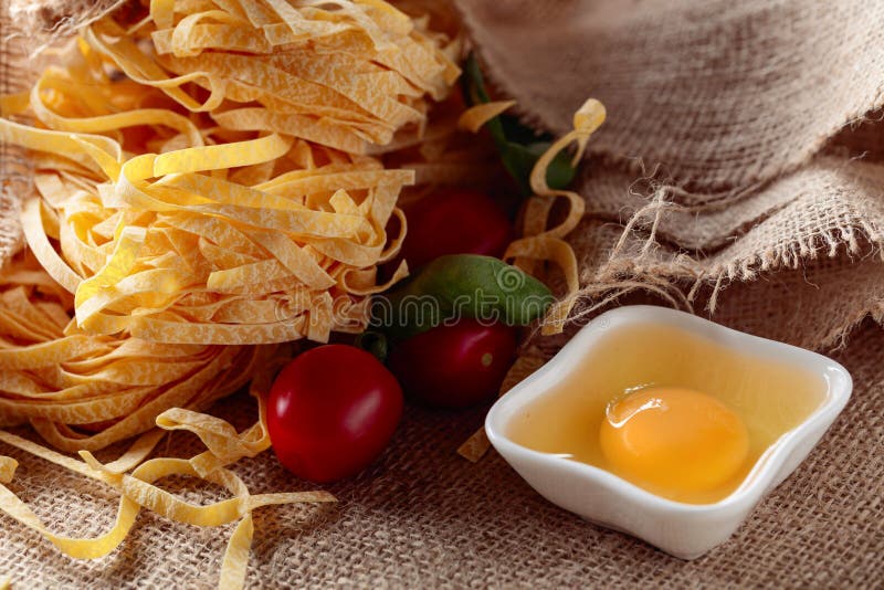 Homemade Raw Egg Noodles with Tomato and Basil Stock Image Image of