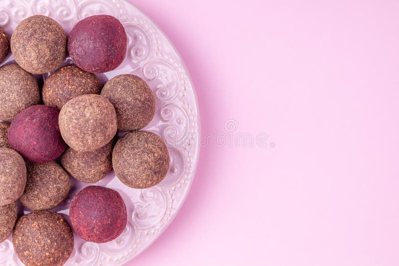 Homemade Raw Vegan Cacao Energy Balls, Healthy Chocolate Candy from Nuts, Dates stock image Homemade Raw Vegan Cacao Energy Balls, Healthy Chocolate Candy from Nuts, Dates stock image