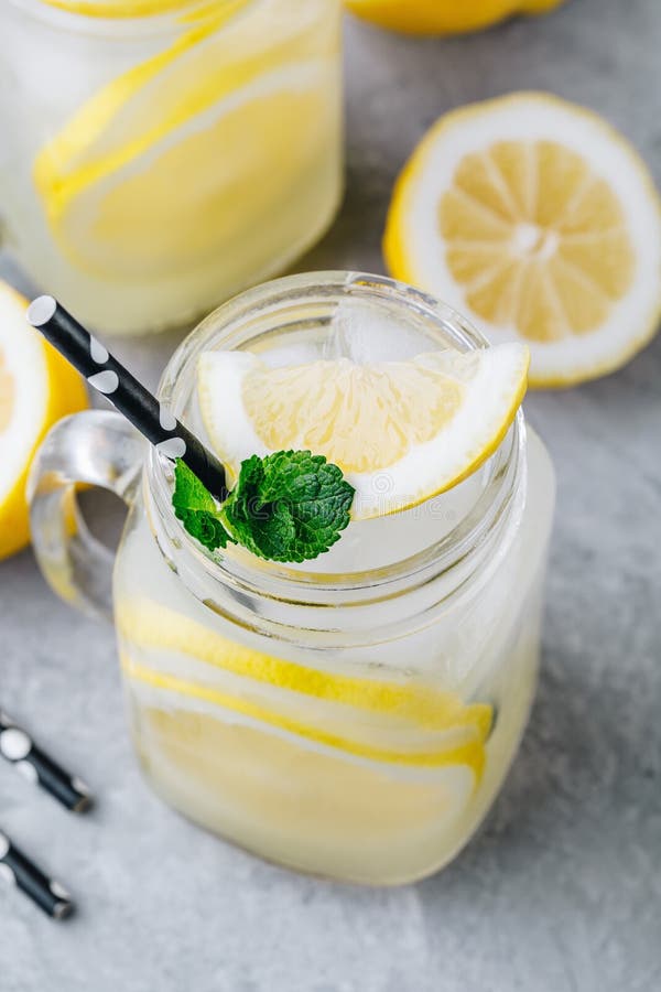 Homemade Refreshing Summer Lemonade Drink with Lemon Slices and Ice in ...