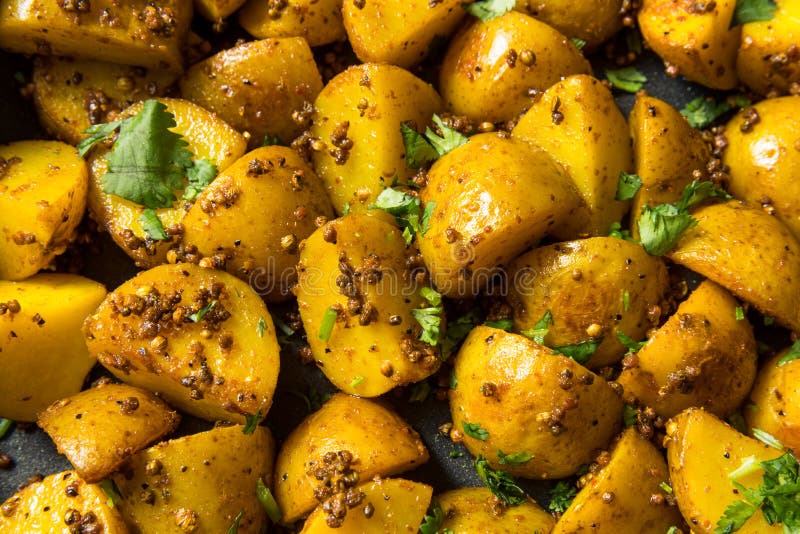Homemade Roasted Mustard Seed Potatoes Stock Photo Image of sliced