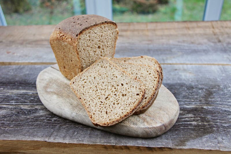 Homemade Rye Sourdough Bread with a Crisp Crust on a Rough Board ...
