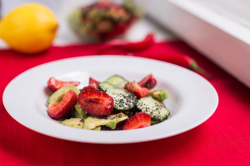 Homemade Salad with strawberries and cucumber royalty free stock photography Homemade Salad with strawberries and cucumber royalty free stock photography
