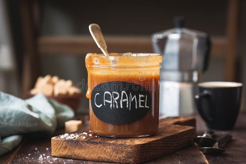 Homemade salted caramel sauce in a jar royalty free stock photos Homemade salted caramel sauce in a jar royalty free stock photos