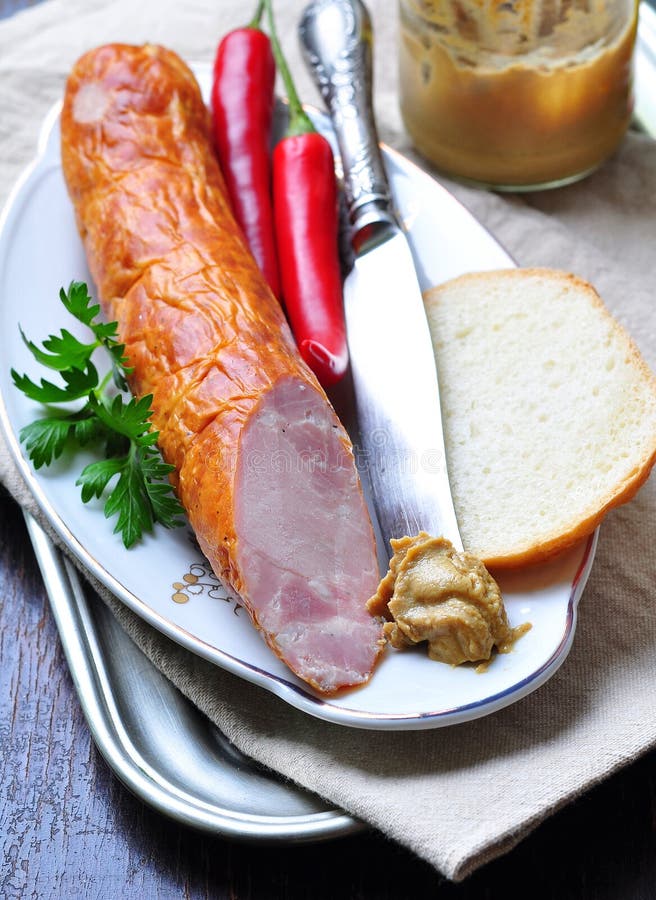 Homemade Sausage with Mustard, Hot Pepper and Bread Stock Photo Image