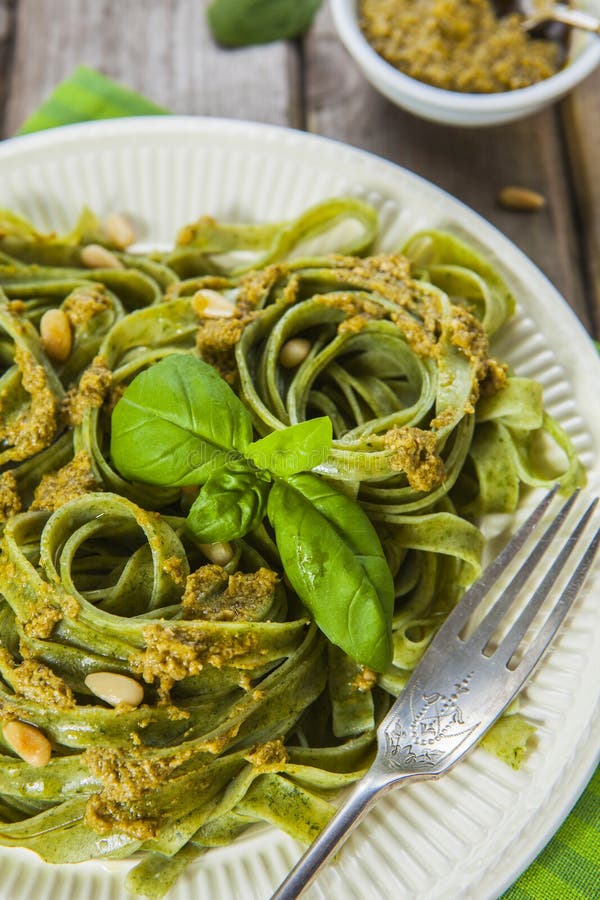 Homemade Spinach Pasta with Pesto Stock Photo - Image of noodles, cloth ...